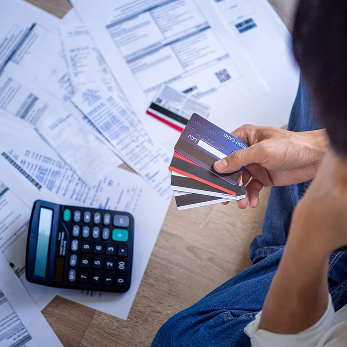 man looking at bills