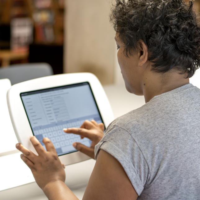 woman using tablet