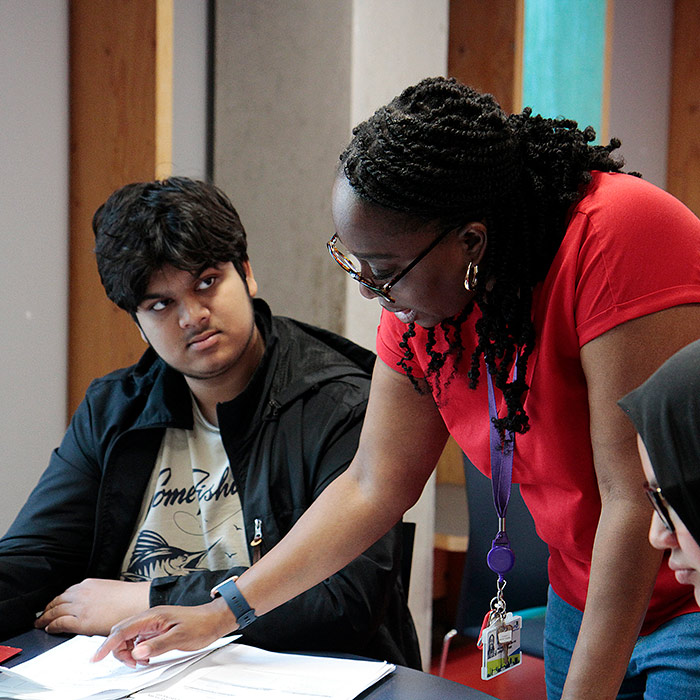 teacher and pupil in a classroom