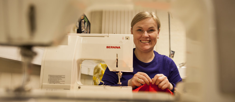 woman at sewing machine