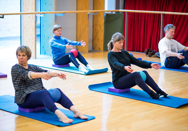 students doing pilates