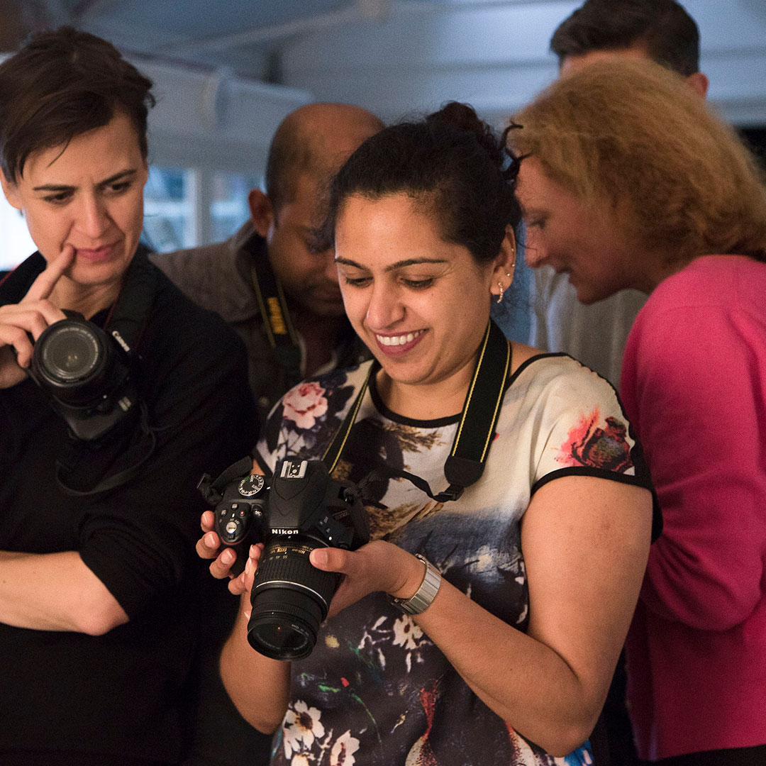 student with camera