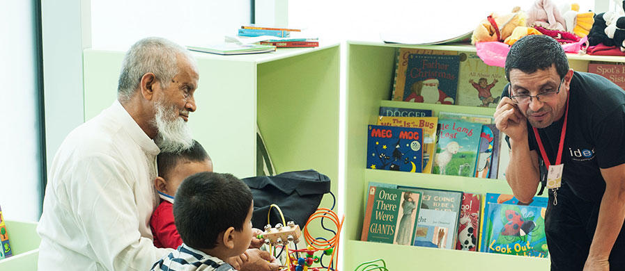 staff doing story time