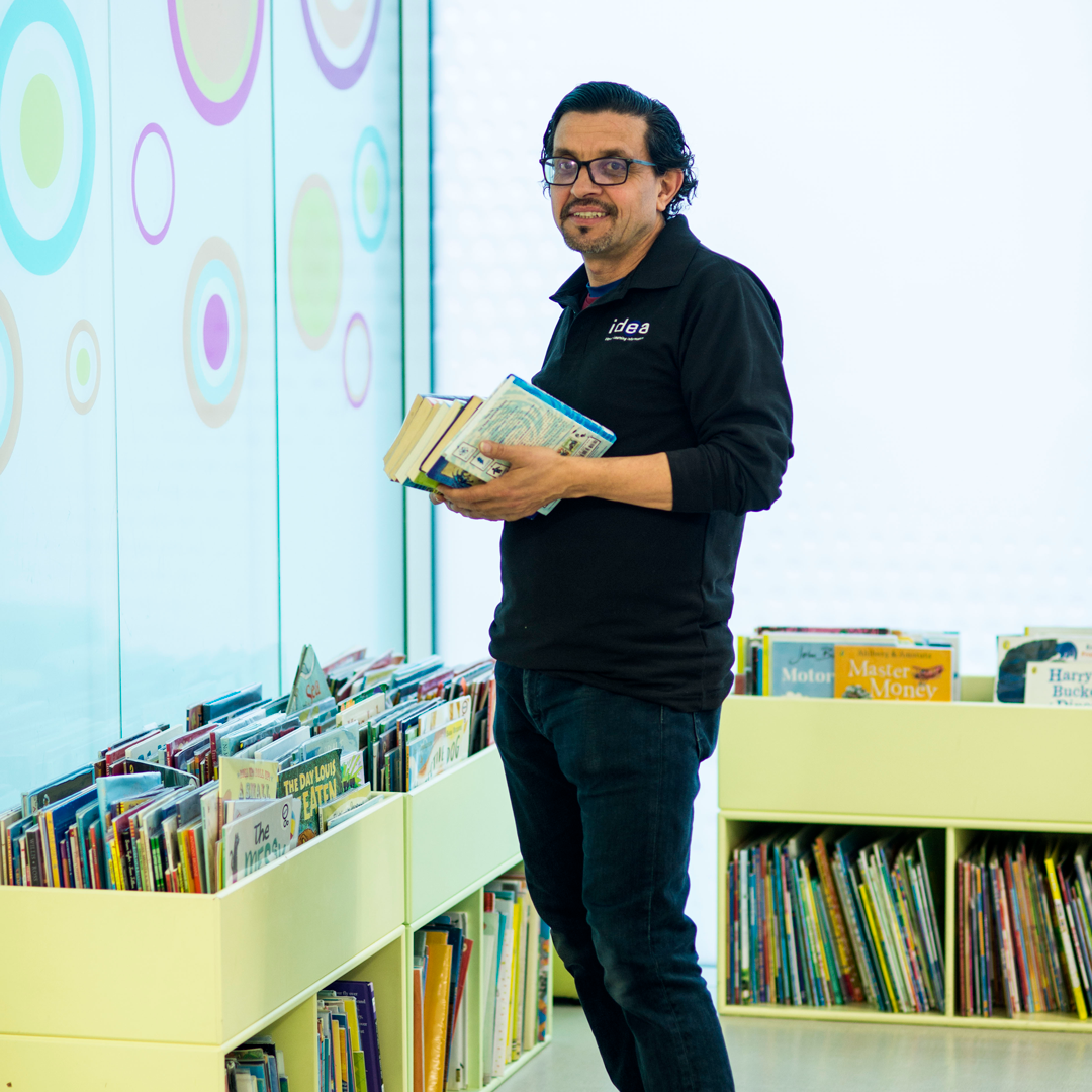 member of staff in children's library
